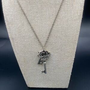 American Eagle long silver tone necklace with two skeleton keys
